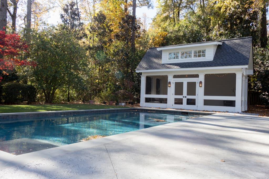 Outdoor pool with a poolhouse