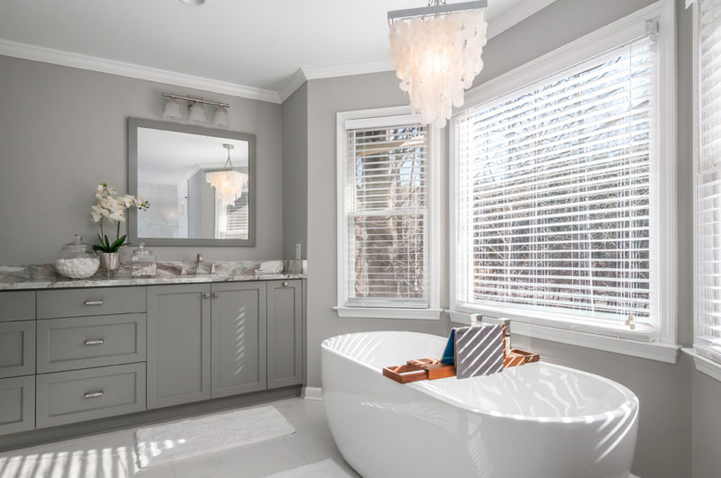 Luxurious master bathroom with freestanding tub