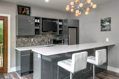 Modern basement with entertaining kitchen bar