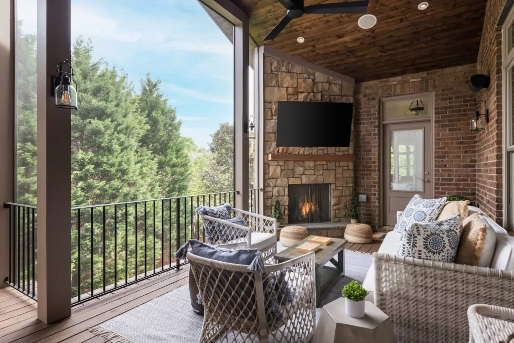 Relax in a family-friendly screened porch, complete with a fireplace and television for ultimate comfort.