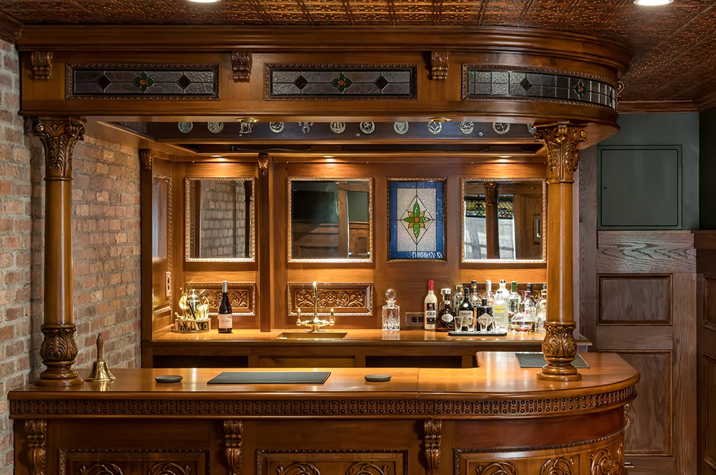 complete look of wooden bar in the basement room with brick walls