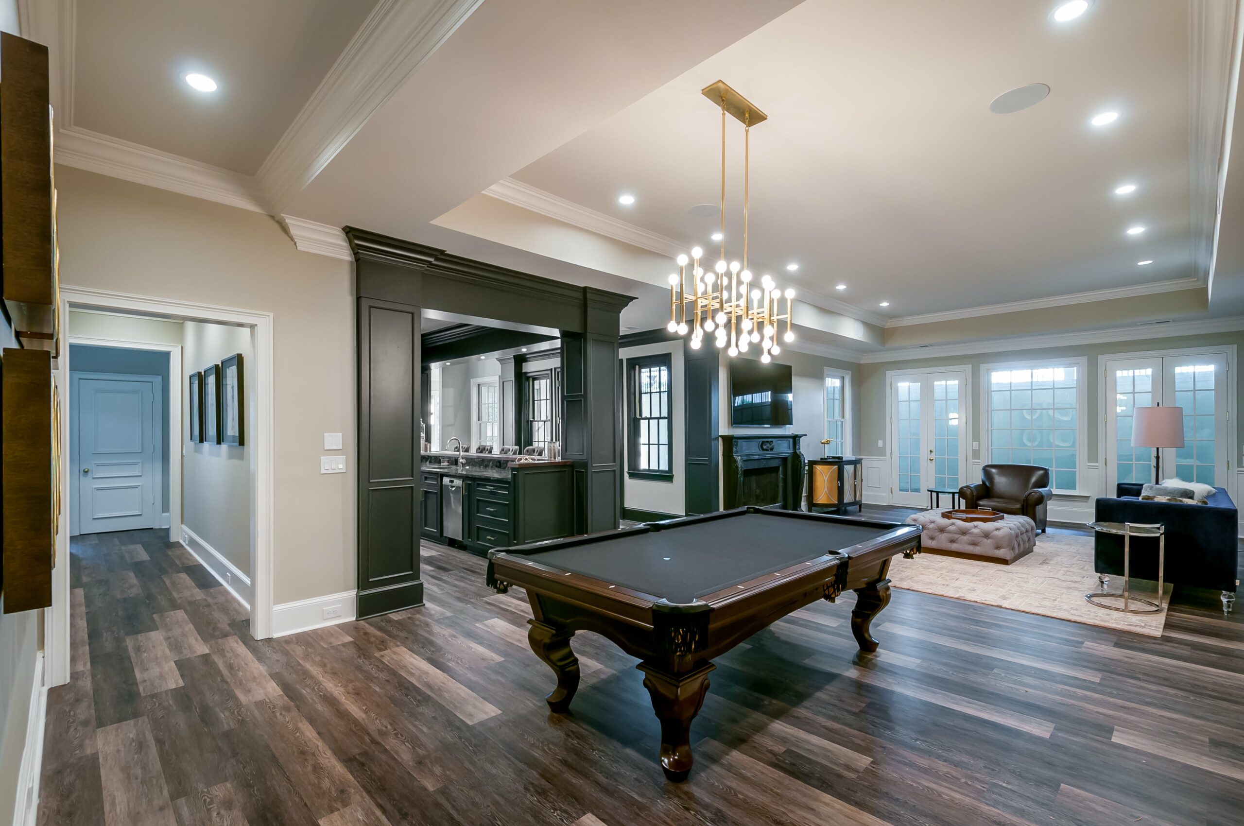 Basement remodel with billiards table and game room