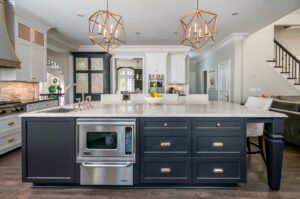custom kitchen remodel with undercounter appliance and lighting features
