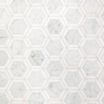a white marble wall with hexagonal pattern