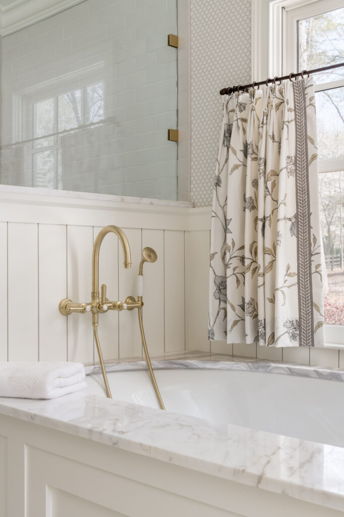 a bathroom with a tub, shower curtain and window how to add your personal style at home