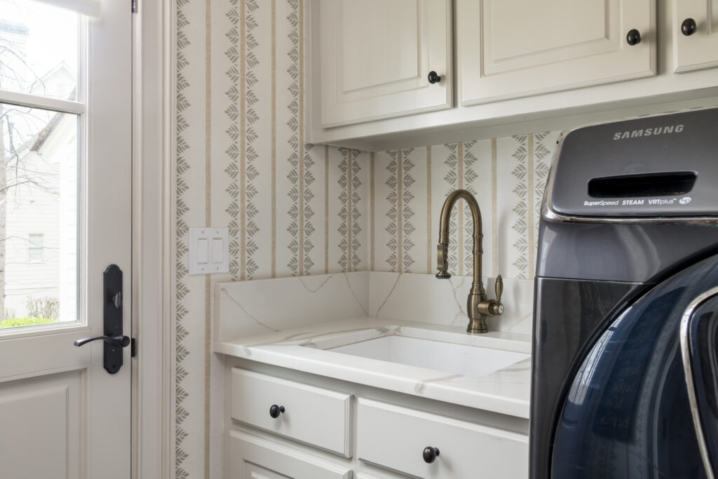 5 Must-Have Laundry Rooms Features wallpaper sink quartz counter