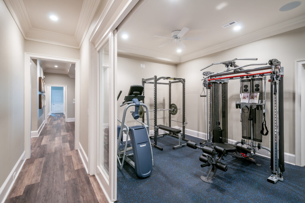a newly remodeled home gym with exercise equipment