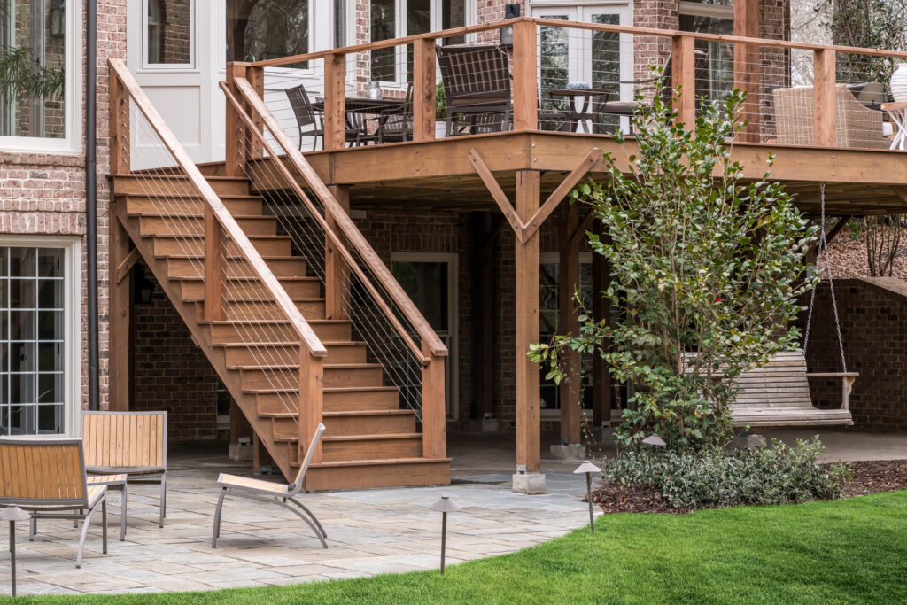 New Covered Porch With Outdoor Kitchen and Lounge patio and porch swing
