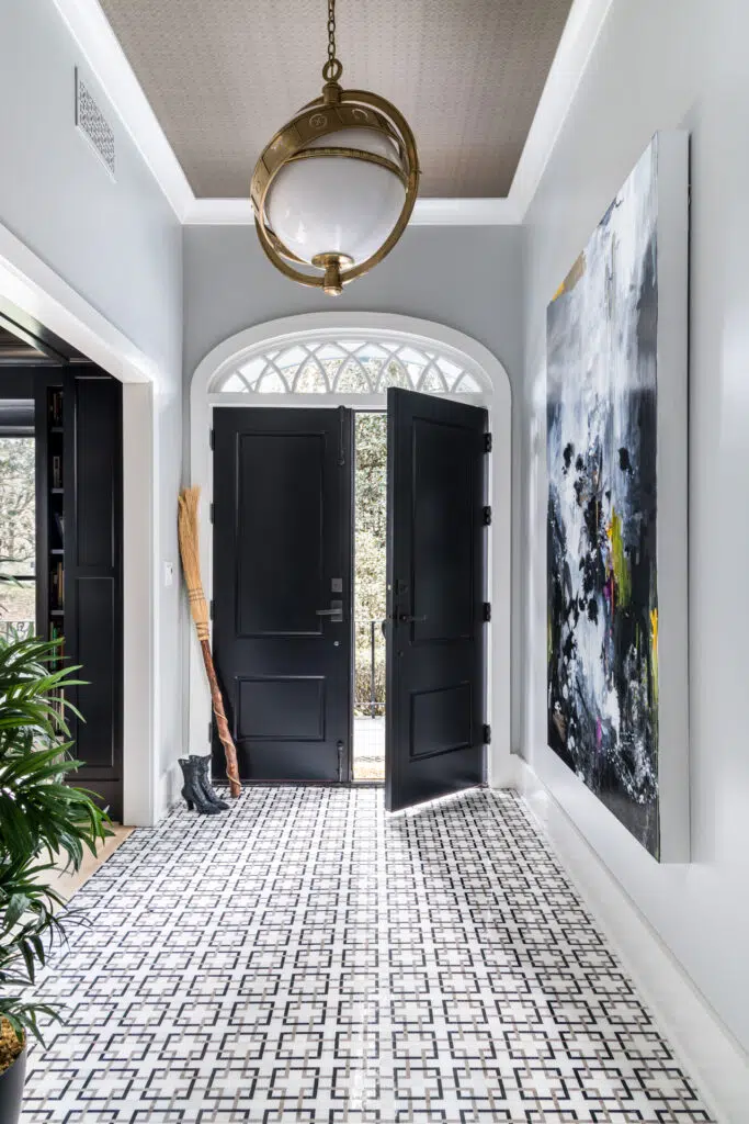 Eclectic moody edgy foyer Art Installations in Luxury Interiors. mosaic tile floor. 