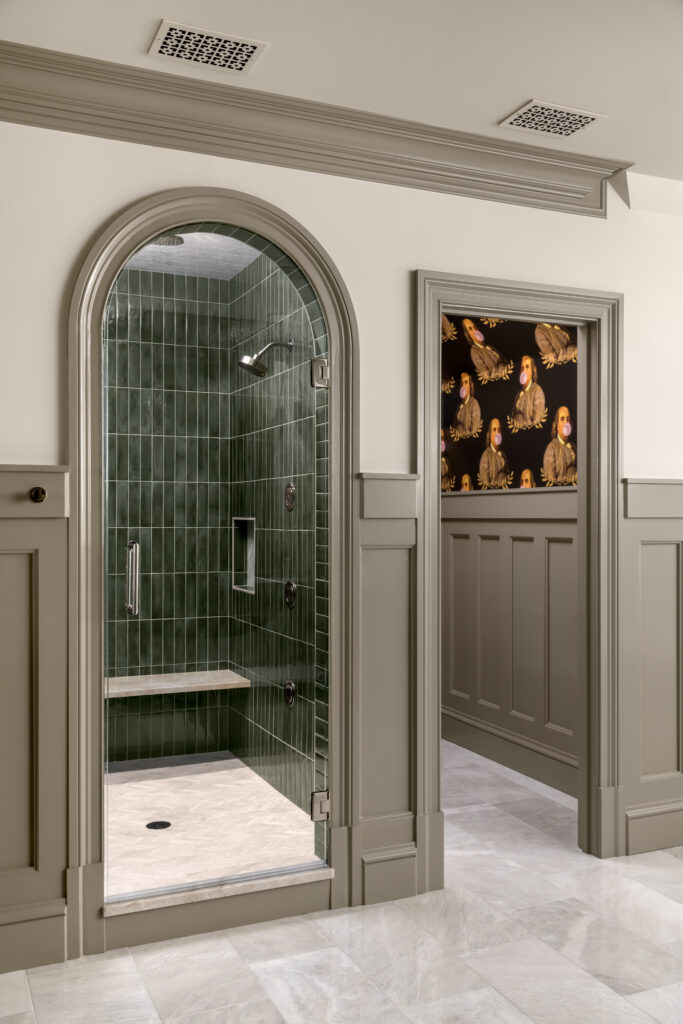 green shower tile, toilet room with wallpaper