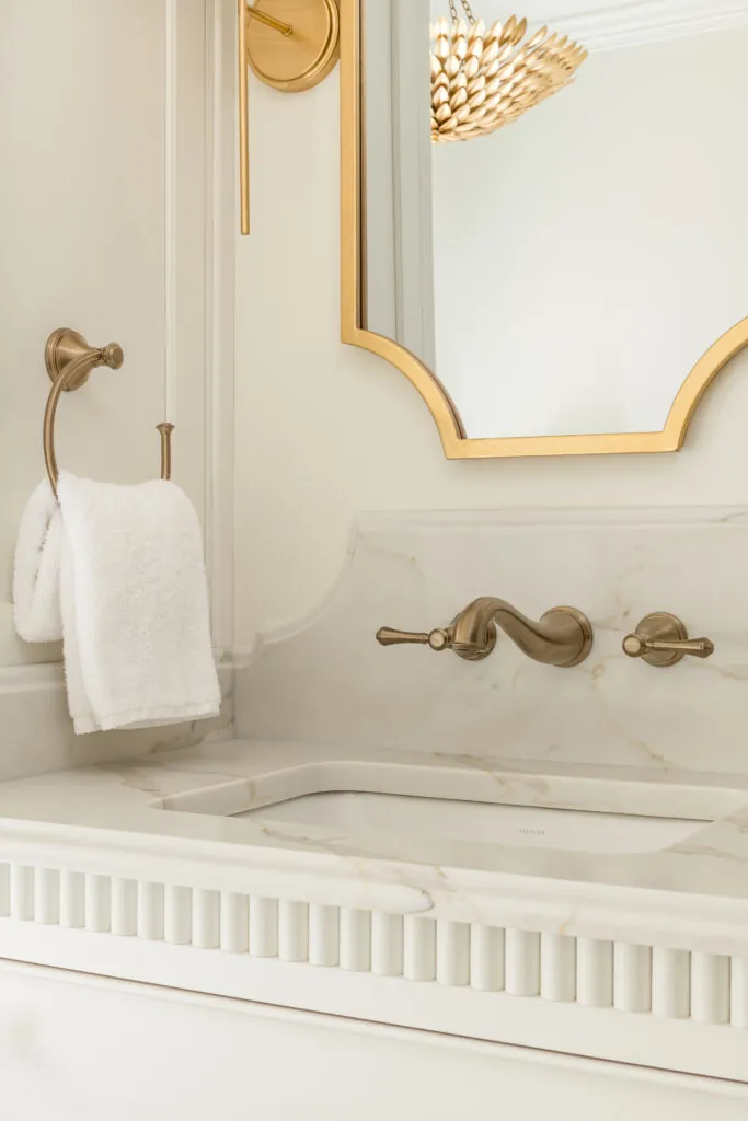 Serene Primary Bathroom Oasis wall-mounted faucets, scalloped bathroom mirror