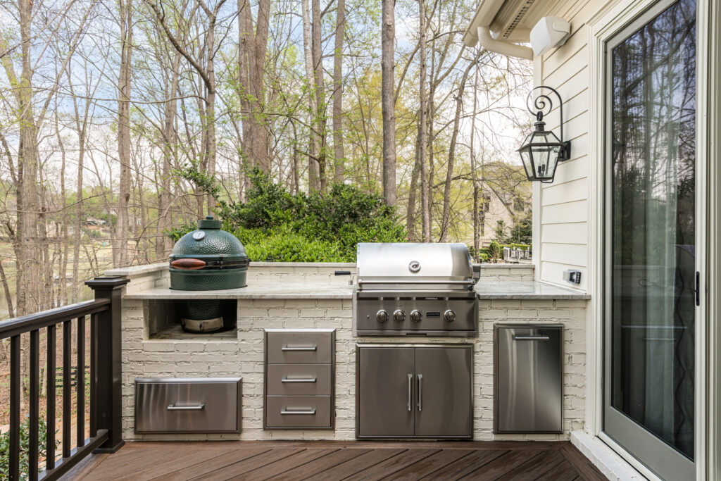 a deck with a grill and a grill on it