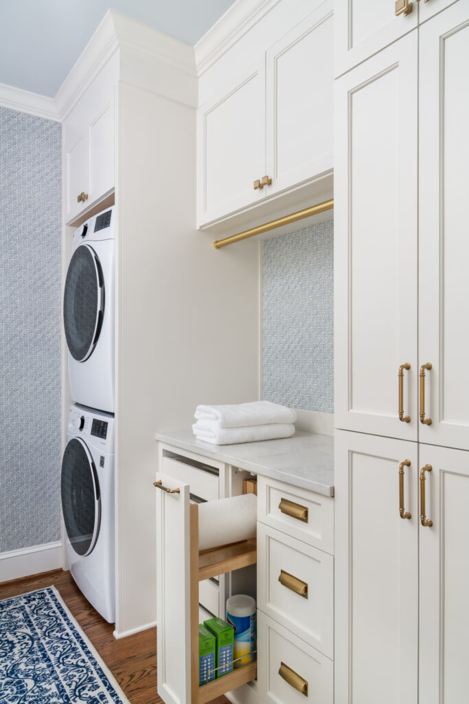 a laundry room with a washer and dryer