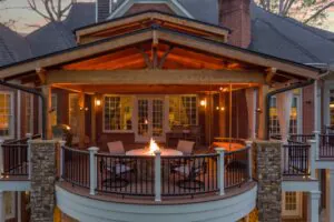 a house with a covered patio and a fire pit