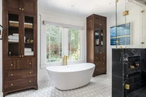 a bathroom with a large tub and a walk in shower