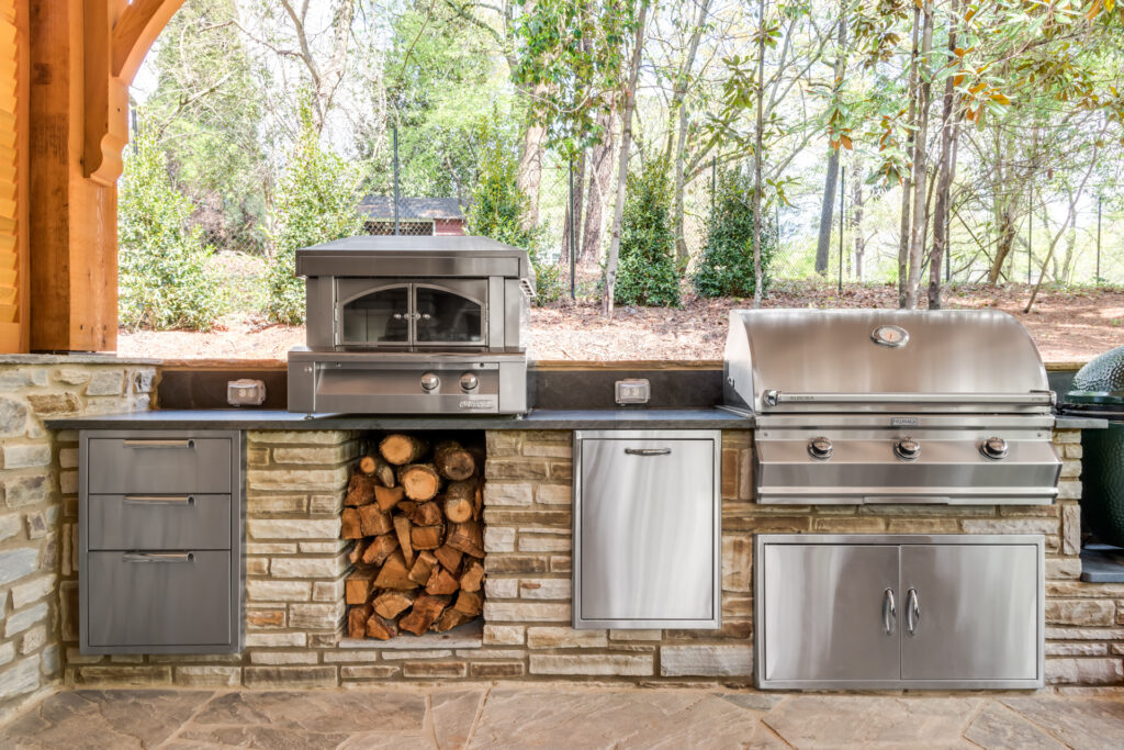 Custom stone outdoor kitchen in a pavilion in Morningside