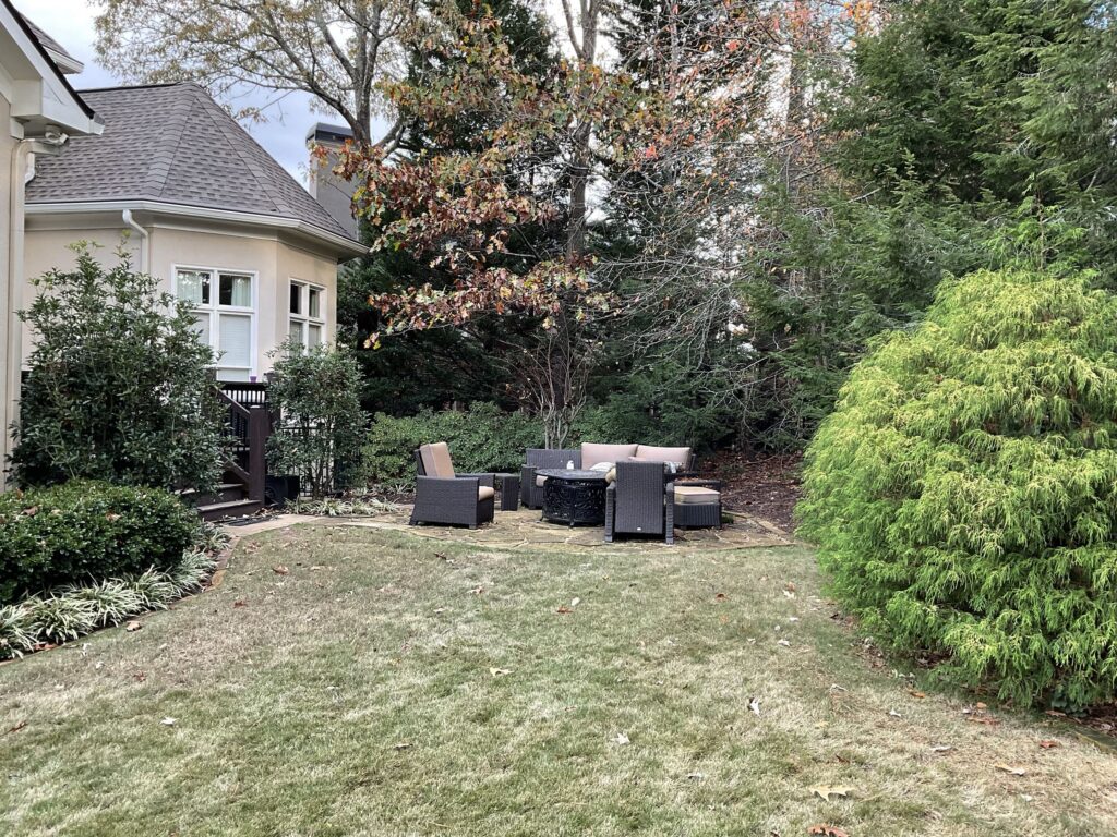 Before photo of a series of outdoor rooms in John's Creek, Georgia