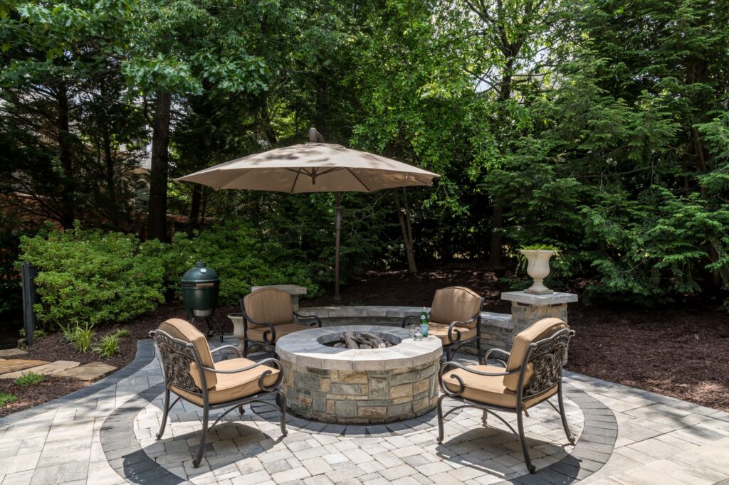 Fire pit patio in a series of outdoor rooms in John's Creek, Georgia